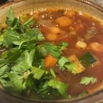 Hearty, satisfying Italian soup with farro, beans and porcini and parmesan.